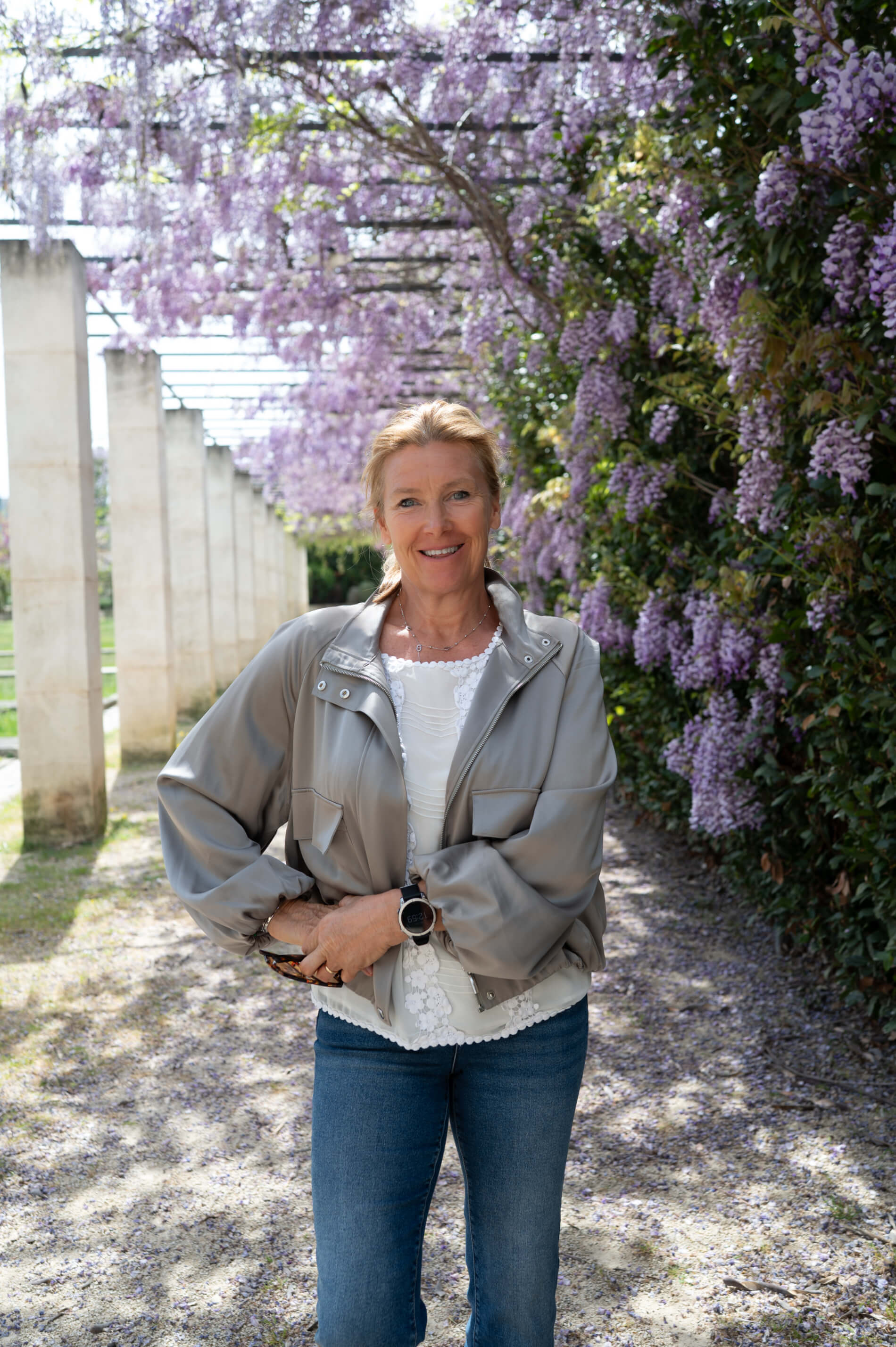 Niki, Founder of Avandra Escapes, faces the camera directly and smiles