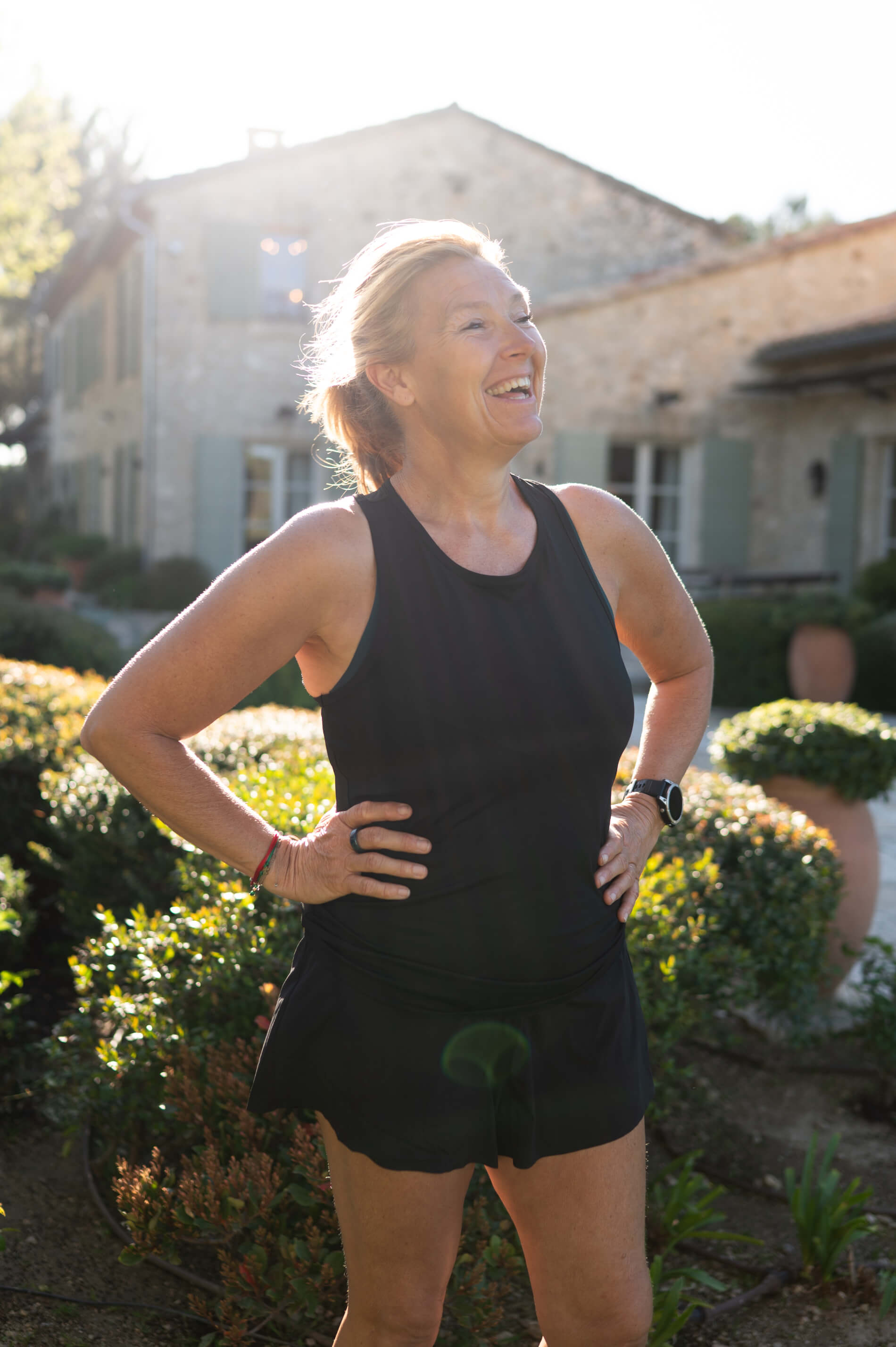 Portrait of Niki, Founder of Avandra Escapes, smiling at the camera